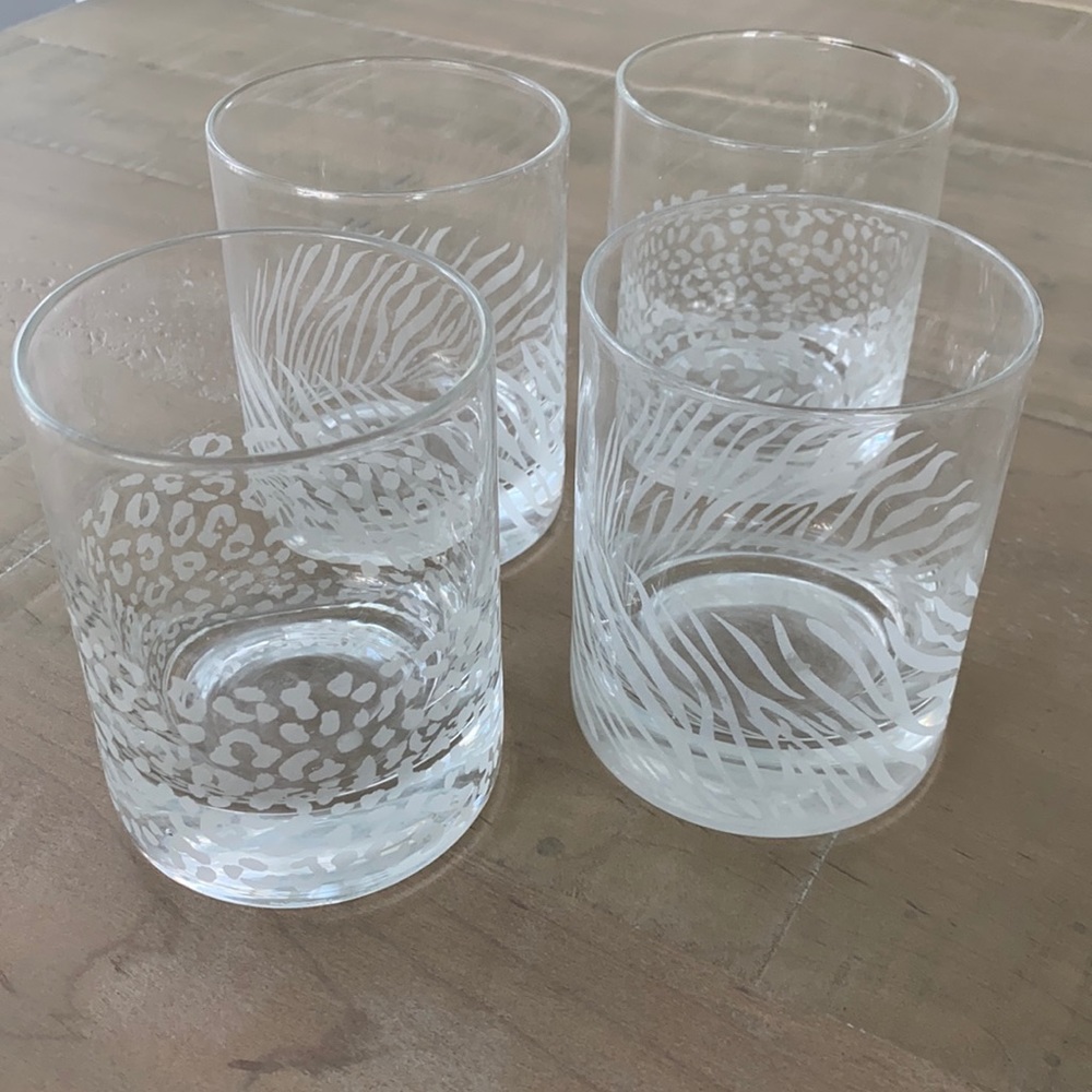 4 animal print glasses. Never used!